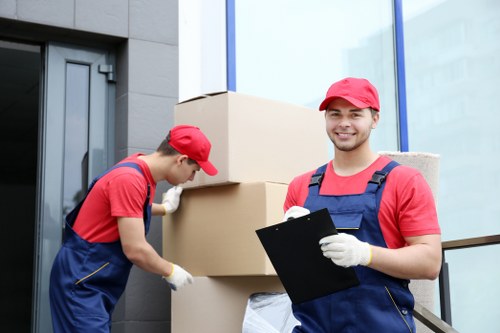 Local home moving service in Tooting with boxes and furniture ready for transport