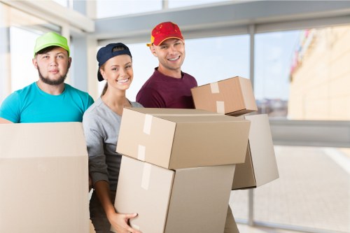 Loading furniture and boxes into a removal van in southwest London