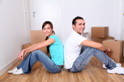Removal team loading furniture for a Tooting home move