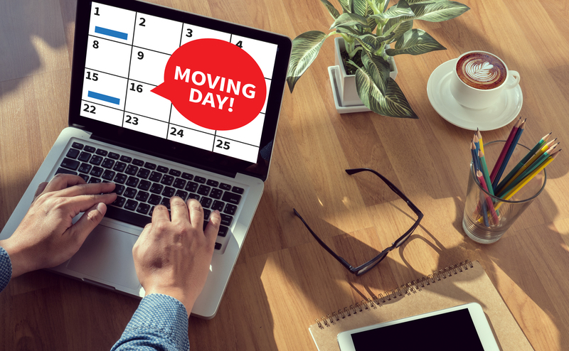 Packing and moving office equipment during a local relocation